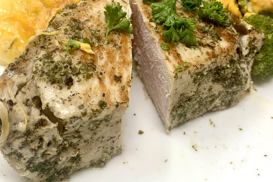 Whole30 Instant Pot Pork Chops Recipe Pork Chops Cut in Half on a Plate