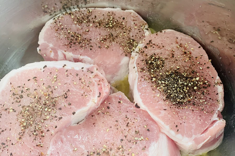 Whole30 Instant Pot Pork Chops Recipe Raw Pork Chops Seasoned in an Instant Pot