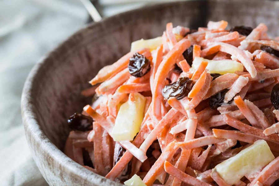 Whole30 Lunch Recipes Close Up of Carrot and Raisin Pineapple Salad in a Bowl