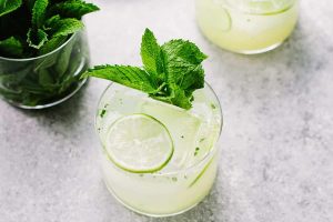 Tequila Drinks that Aren’t Margaritas a Tequila Cocktail Garnished with a Lime Slice and a Mint Sprig