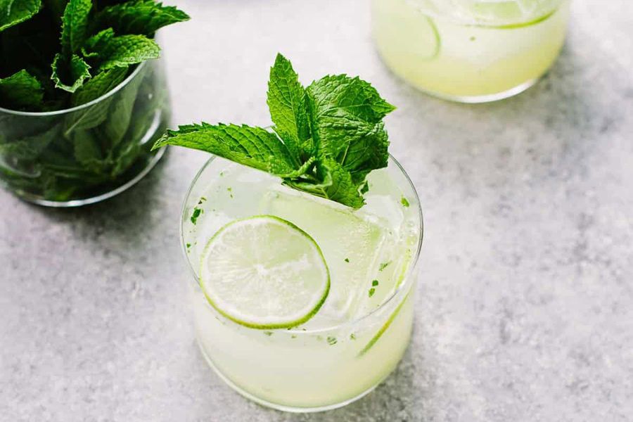 Tequila Drinks that Aren&rsquo;t Margaritas a Tequila Cocktail Garnished with a Lime Slice and a Mint Sprig