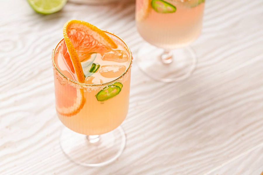 Tequila Drinks That Aren&rsquo;t Margaritas Spicy Paloma Garnished with a Grapefruit Slice and a Jalapeno