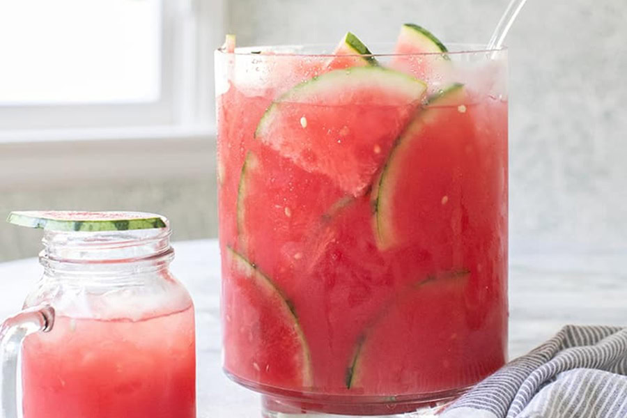 Tequila Drinks That Aren&rsquo;t Margaritas Watermelon Punch Recipe in a Pitcher and in a Glass Next to it