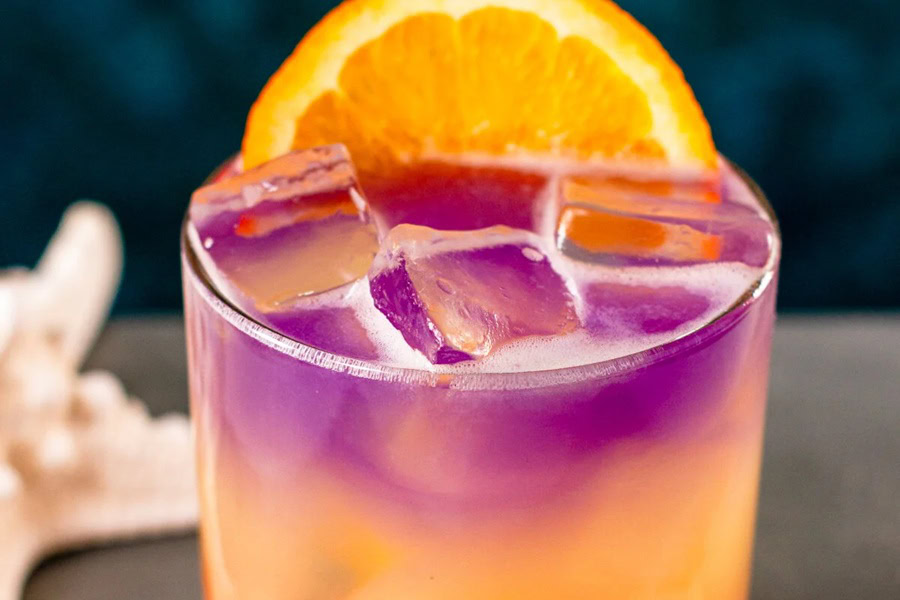 Tequila Drinks That Aren&rsquo;t Margaritas Sandy Sheets Close Up Garnished with an Orange Slice
