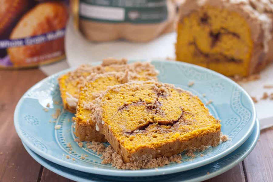 Gluten Free Bread Machine Recipes Two Slices of Gluten Free Pumpkin Cinnamon Swirl Quick Bread on a Blue Plate
