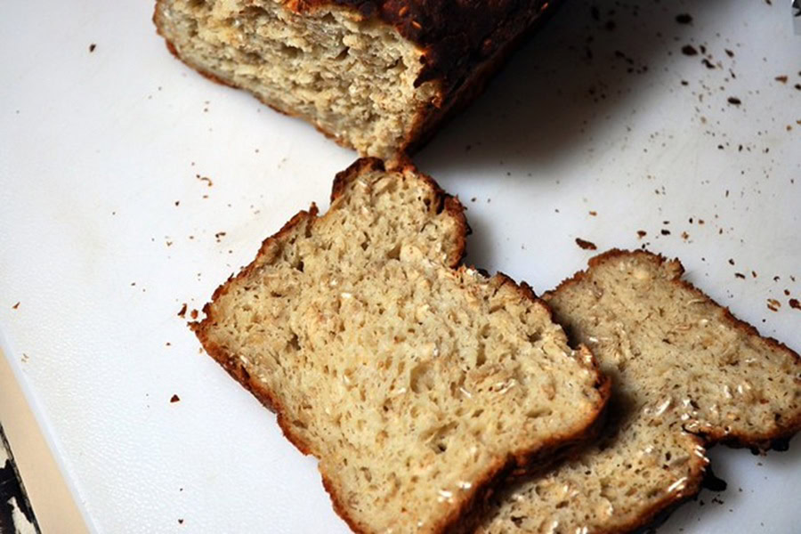 Gluten Free Bread Machine Recipes Gluten Free Oat & Honey Bread on a Cutting Board