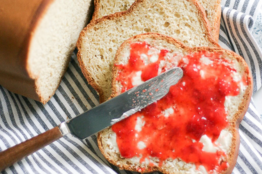 Gluten Free Bread Machine Recipes Perfect Bread Machine Gluten Free Bread with a Slice Covered in Butter and Jam