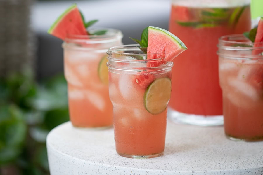 Sangria Recipes Watermelon Sangria in Small Mason Jar Glasses Next to a Pitcher