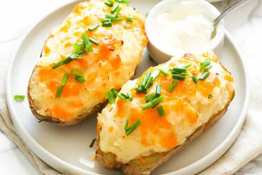 Best Side Dishes for a BBQ Twice Baked Mashed Potatoes in Potato Skins on a White Plate