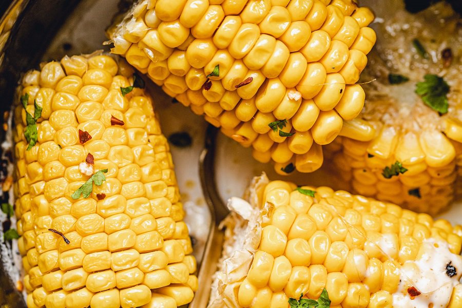 Best Side Dishes for a BBQ Slow Cooker Corn on the Cob with Coconut Milk Close Up