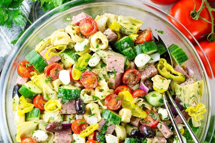 Best Side Dishes for a BBQ Italian Tortellini Pasta Salad in a Glass Bowl