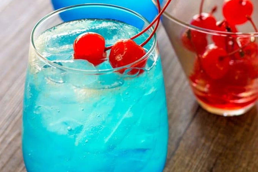 Red White and Blue Drink Recipes with Alcohol Close Up of a Space Pop Cocktail with Ice