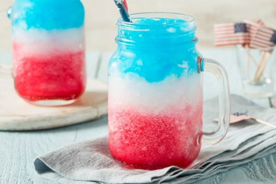 Red White and Blue Drink Recipes with Alcohol Two Mason Jars Filled with Patriotic Coconut Rum Slushy Cocktail