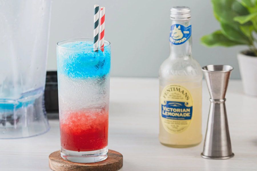 Red White and Blue Drink Recipes with Alcohol Star-Spangled Slushie Recipe in a Glass