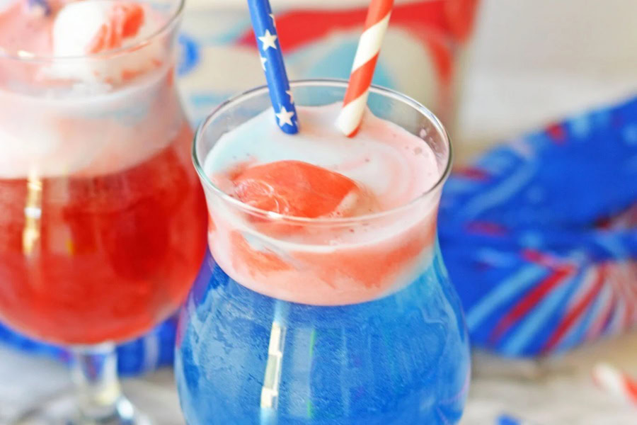 Red White and Blue Drinks Red White and Blue Punch in Glasses with Straws