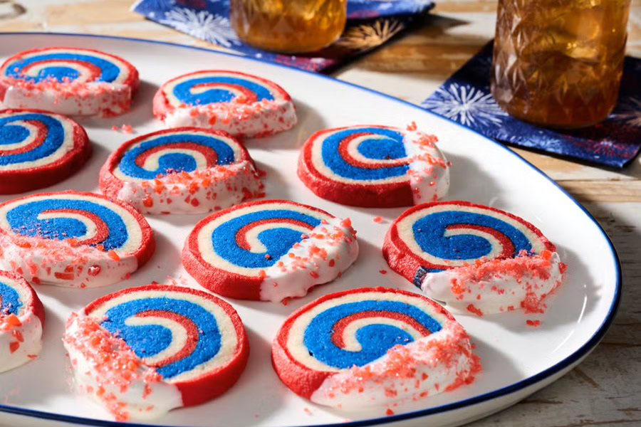 Red White and Blue Desserts Red, White, and Blue Fireworks Cookies on a White Serving Plate
