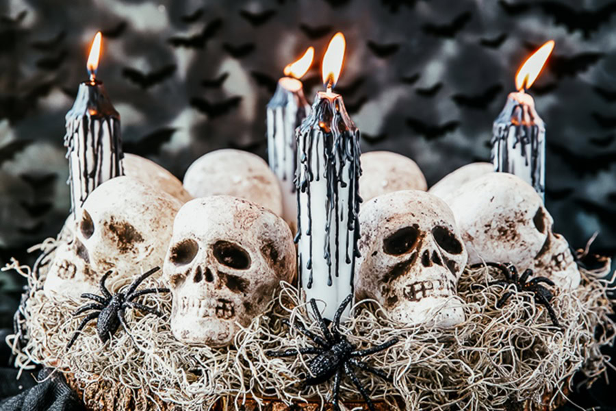 Halloween Decorations for a Spooky Party Halloween Skull Centerpiece With Two Candles