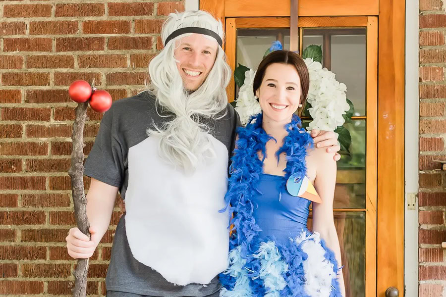 DIY Couple Halloween Costume Ideas a Man Dressed as Rafiki and a Woman Dressed as a Bird Standing Together on a Patio