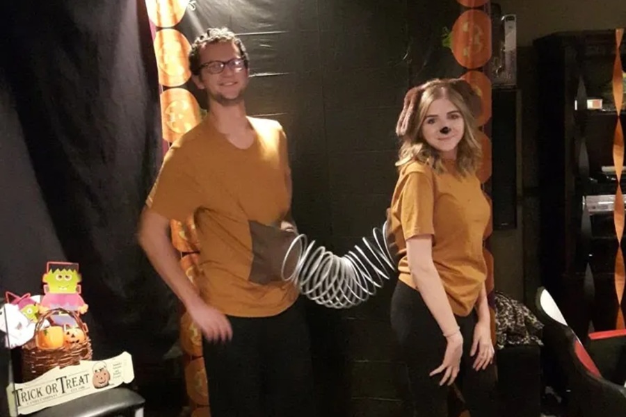 DIY Couple Halloween Costume Ideas a Couple Dressed in Brown with a Slinky Attached to the Front of a Man and the Other End Attached to the Back of a Woman