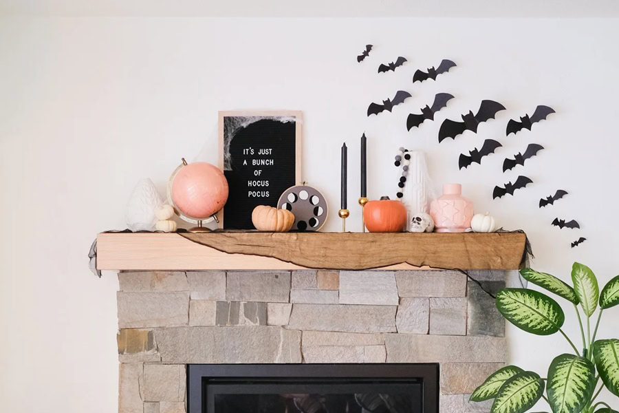 Halloween Decorations for a Spooky Party How to Make Paper Bats on a Wall Above a Fireplace