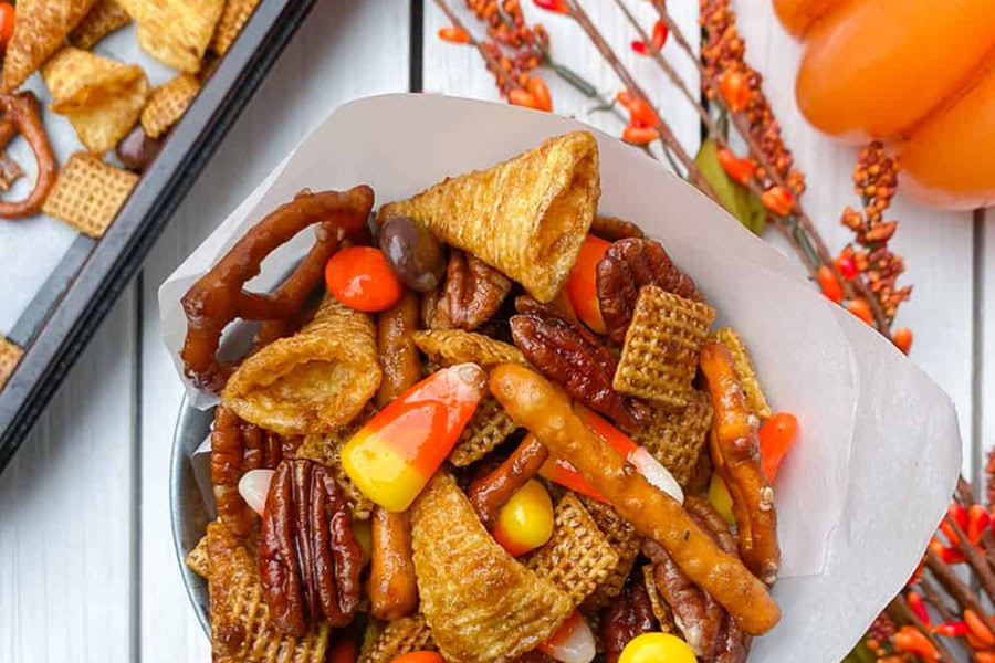 Halloween Party Food Ideas for Kids Halloween Pumpkin Spiced Chex Mix in a Paper Cone Container